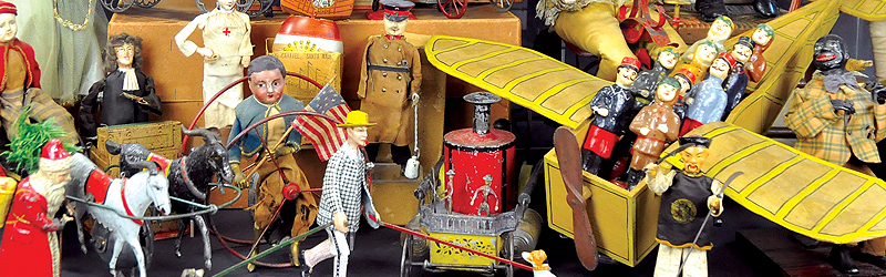 header-button-bertoia-signature-auctions-antique-toys-2018-september-martin-automaton-tin-trains-stations